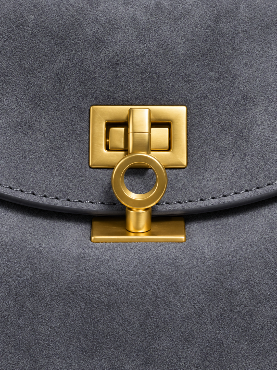 Faustine — Suede bag with gold-tone clasp