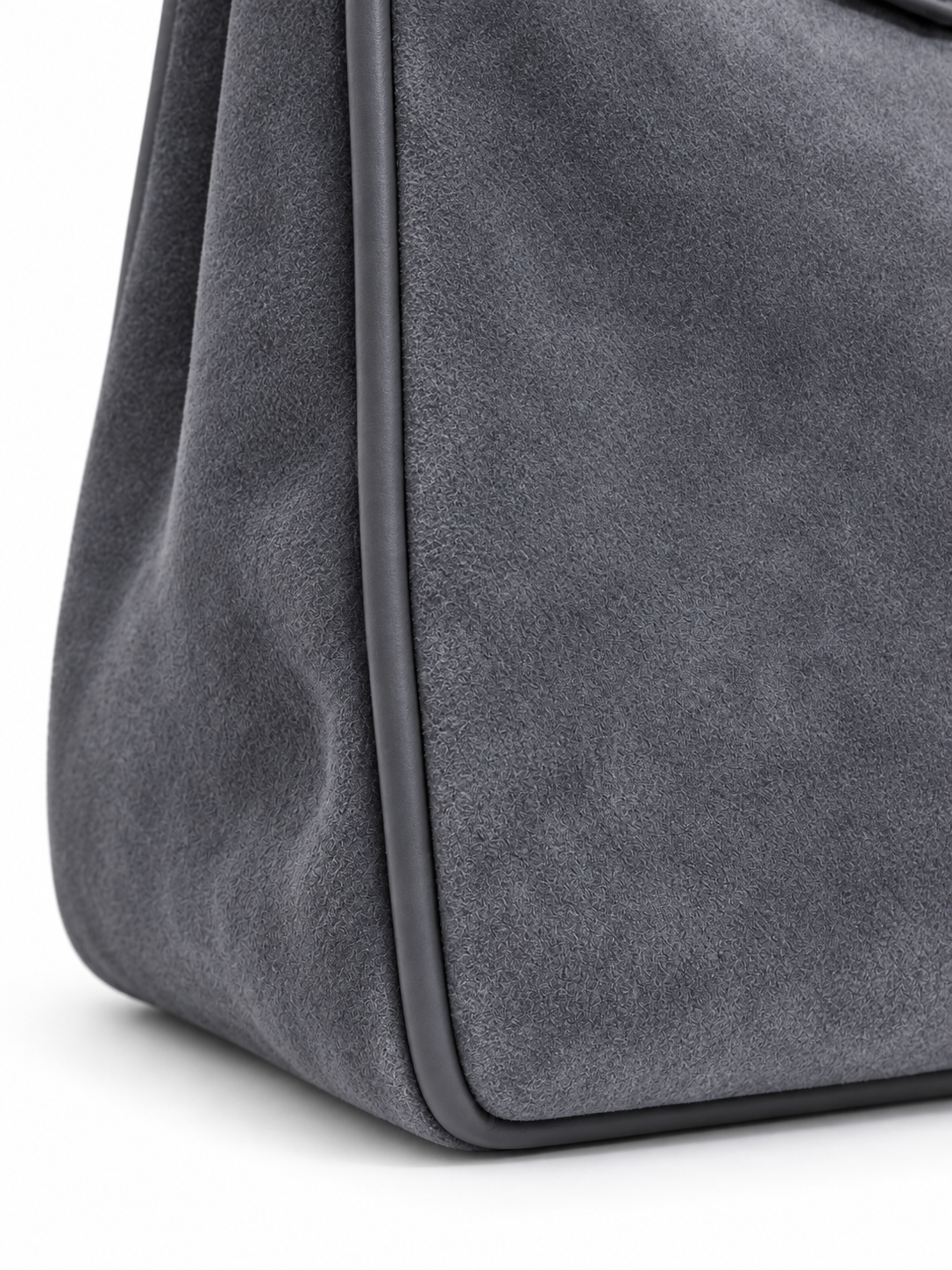 Faustine — Suede bag with gold-tone clasp