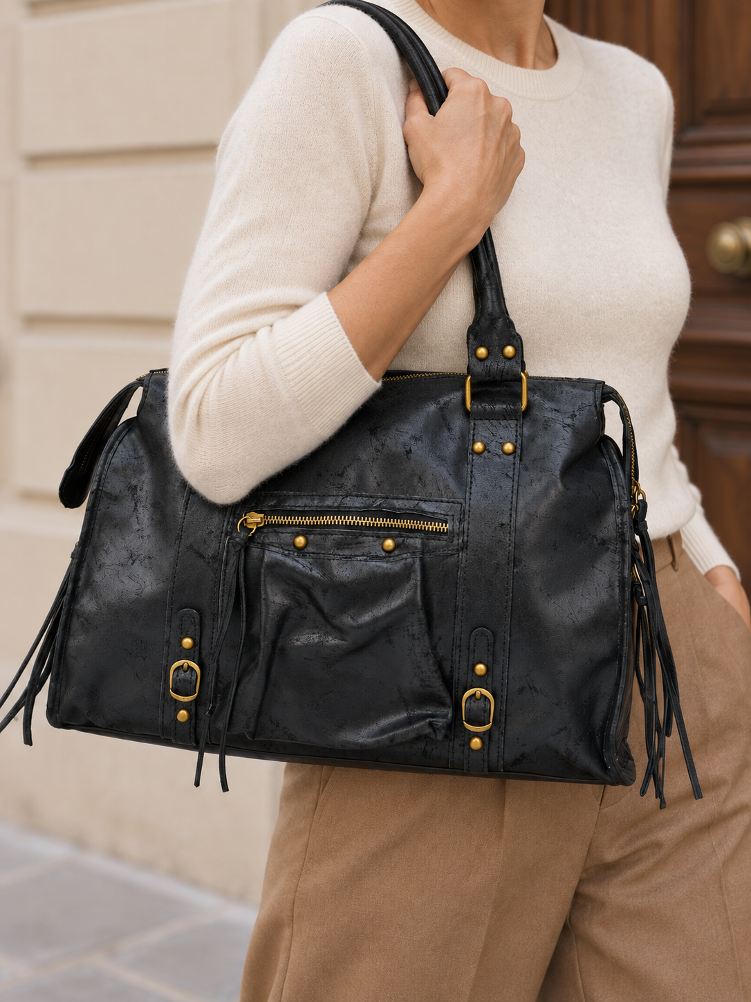 Margot — Leather bowling bag with gold-tone accents
